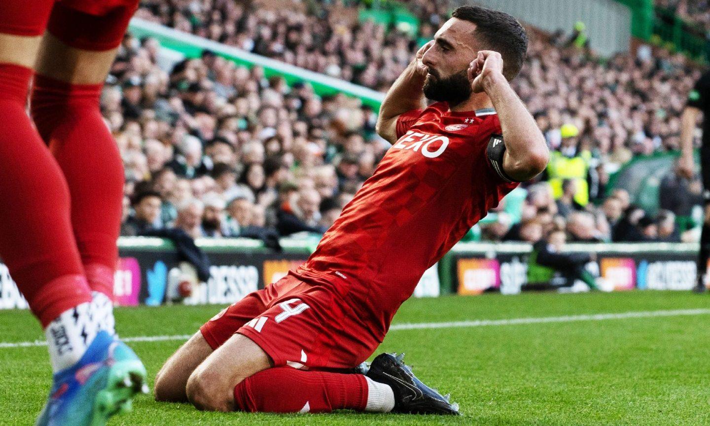 Aberdeen captain Graeme Shinnie celebrates after scoring to make it 2-2 against Celtic at Parkhead.