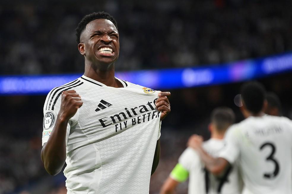 Vinicius Junior comemora um de seus gols na vitória do Real Madrid sobre o Borussia Dortmund