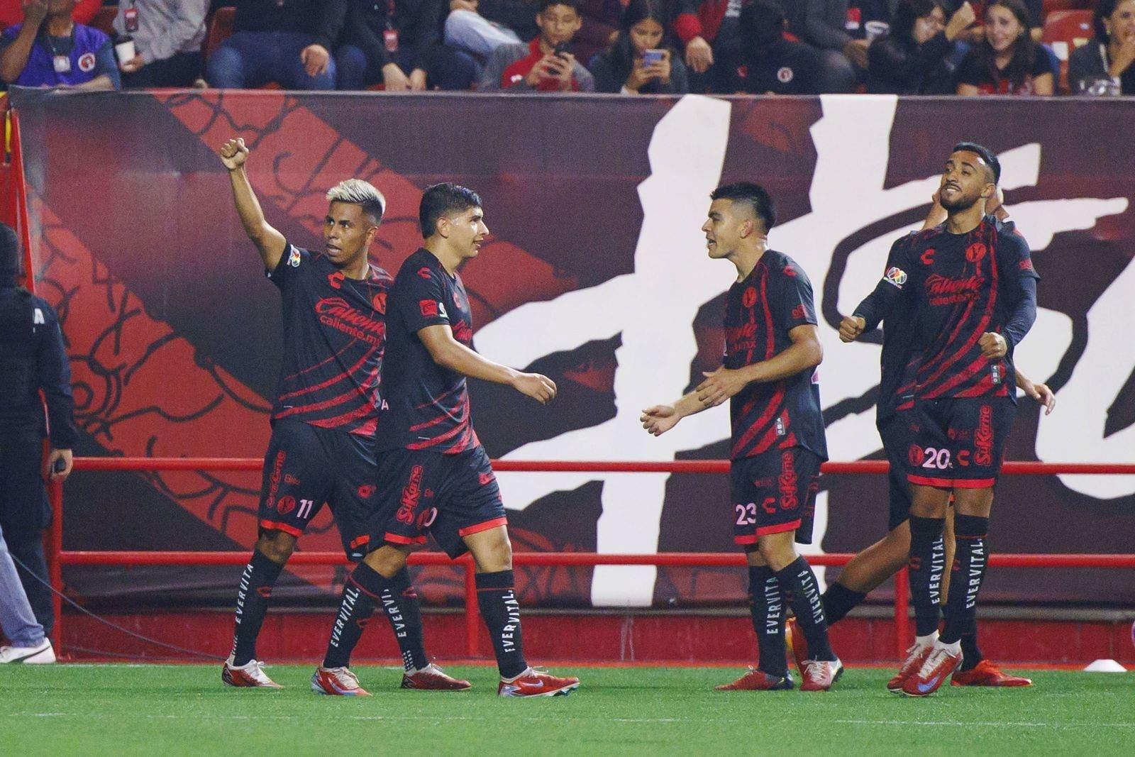 Jogadores do Xolos celebrando a vitória sobre o Pachuca