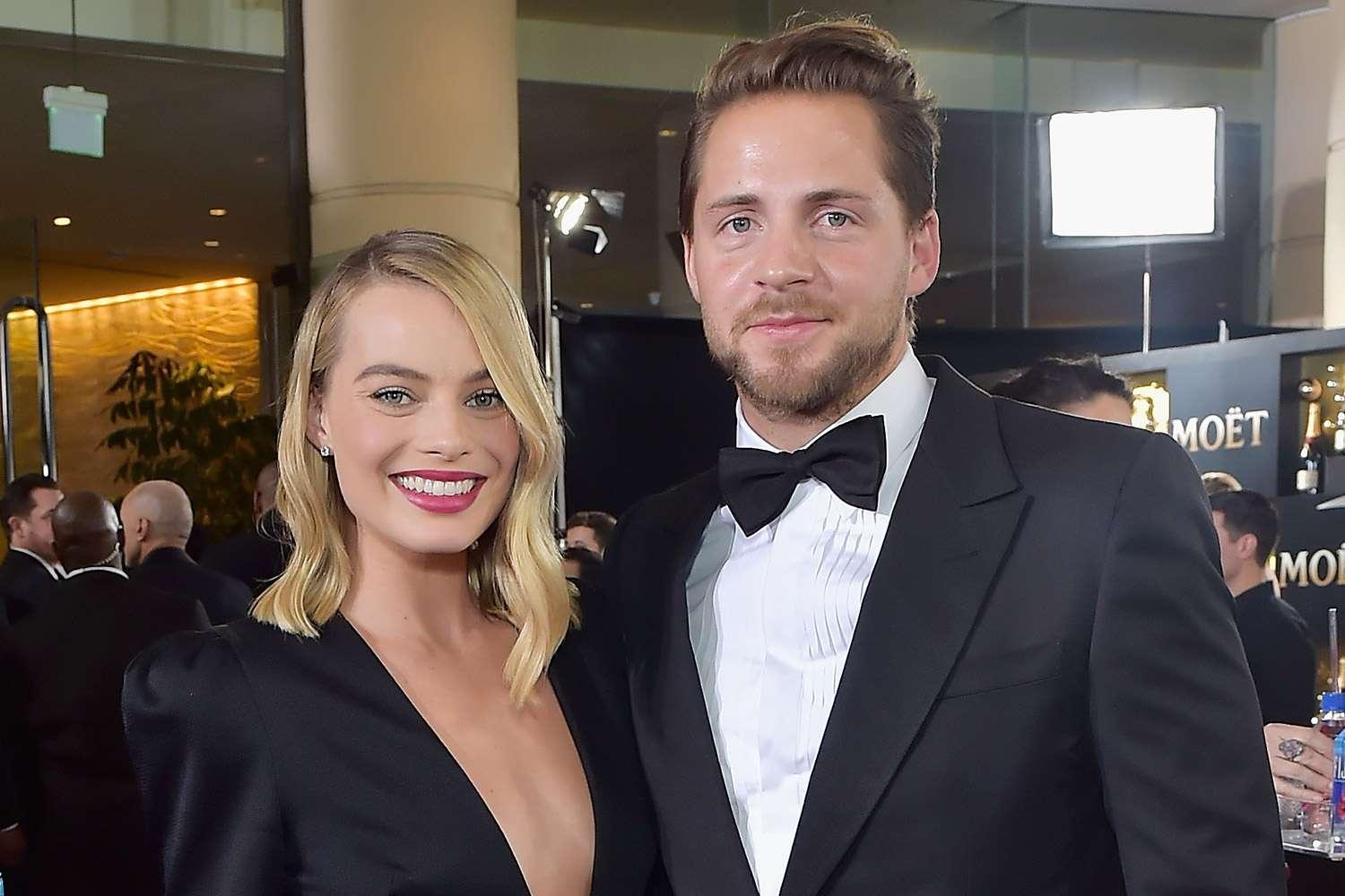 Margot Robbie e Tom Ackerley no Golden Globe Awards