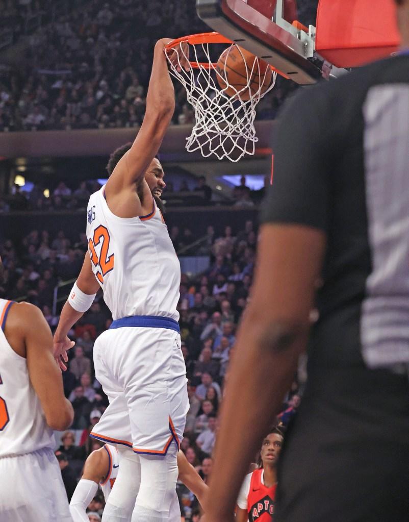 Karl-Anthony Towns dunks during the Knicks-Raptors game on Dec. 23, 2024.