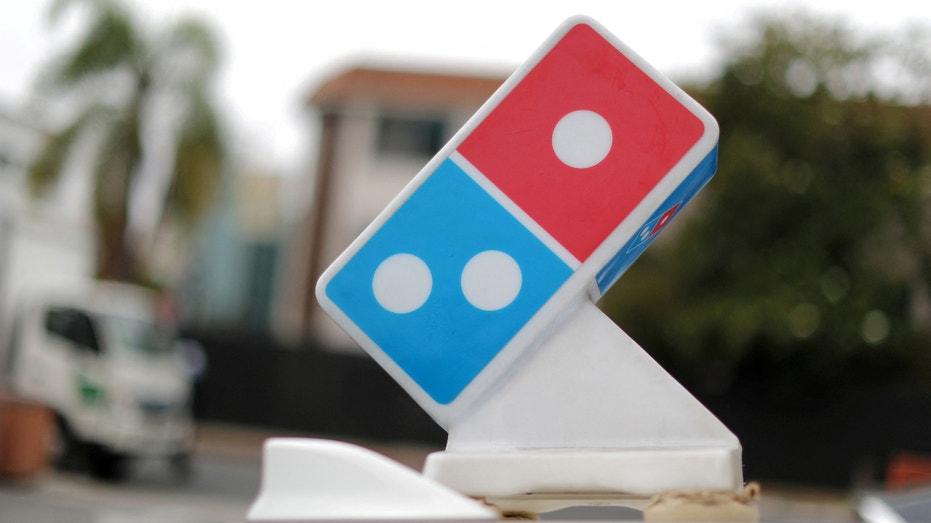 Domino's Pizza sign delivery car
