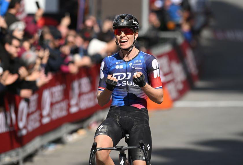 Demi Vollering celebrate at the finish line during the Strade Bianche 2025