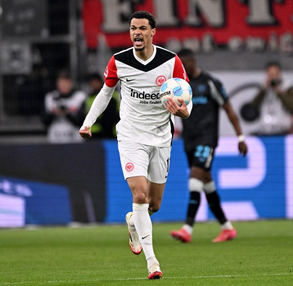 Hugo Ekitike celebrating a goal during a Bundesliga soccer match