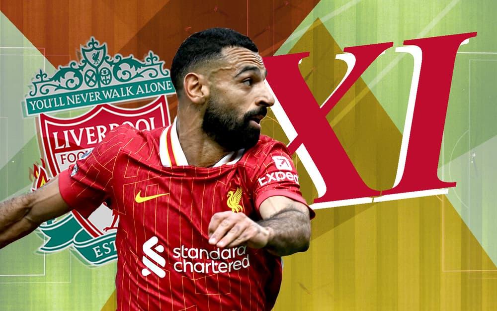 Mohamed Salah em frente ao emblema do Liverpool FC