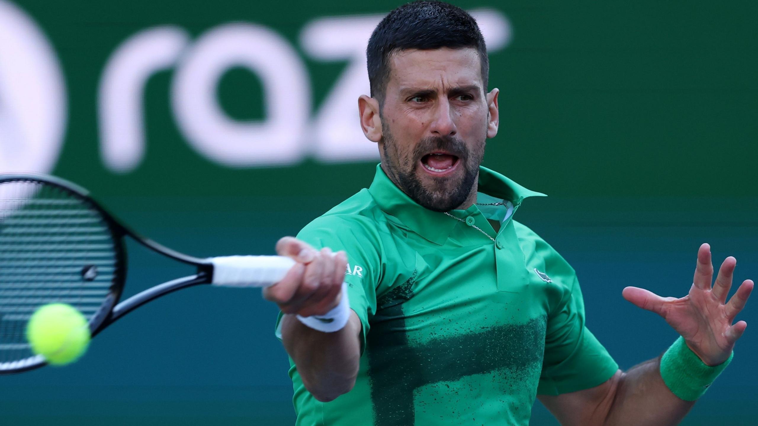 Novak Djokovic hits a forehand during his second-round match at Indian Wells.
