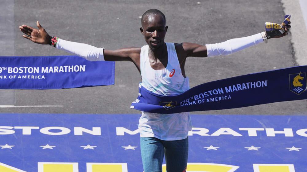 John Korir, of Kenya, breaks the tape to win the Boston Marathon, Monday. (Charles Krupa/AP)