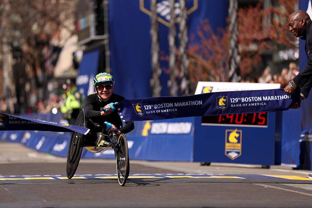 Marcel Hug of Switzerland crosses the finish line to win the 129th Boston Marathon Men's Wheelchair. (Maddie Meyer/Getty Images)