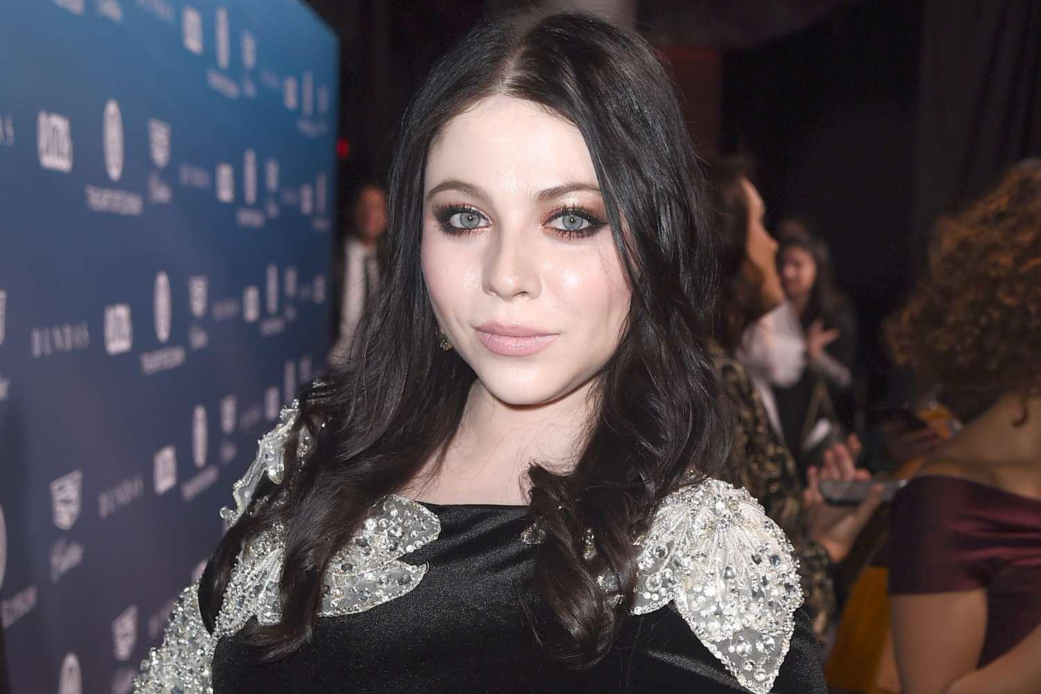 Michelle Trachtenberg em evento de caridade