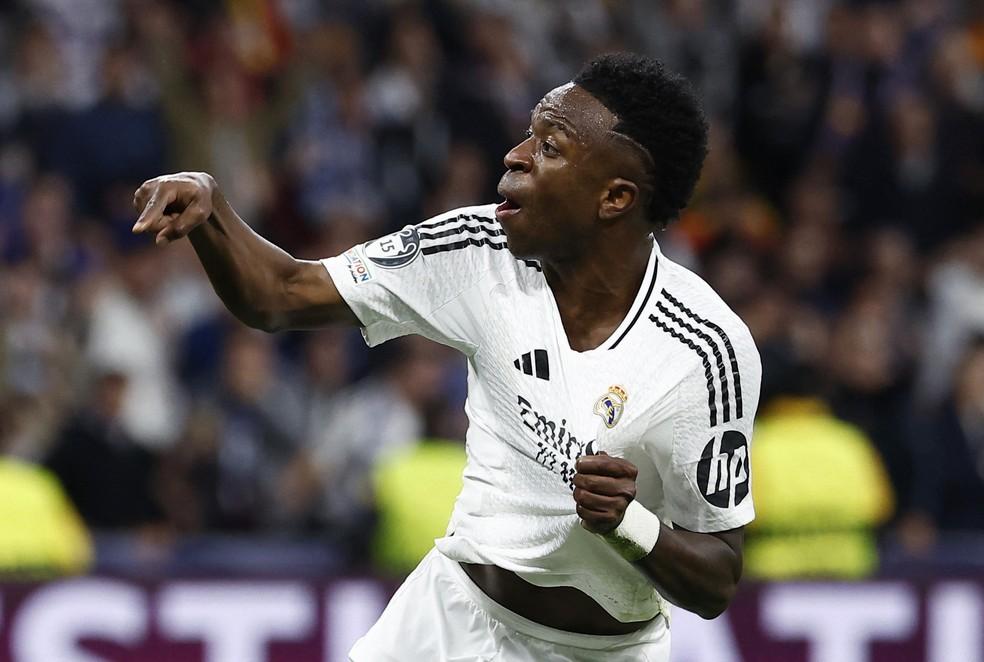 Vinícius Junior comemora o gol marcado pelo Real Madrid contra o Arsenal na Champions League