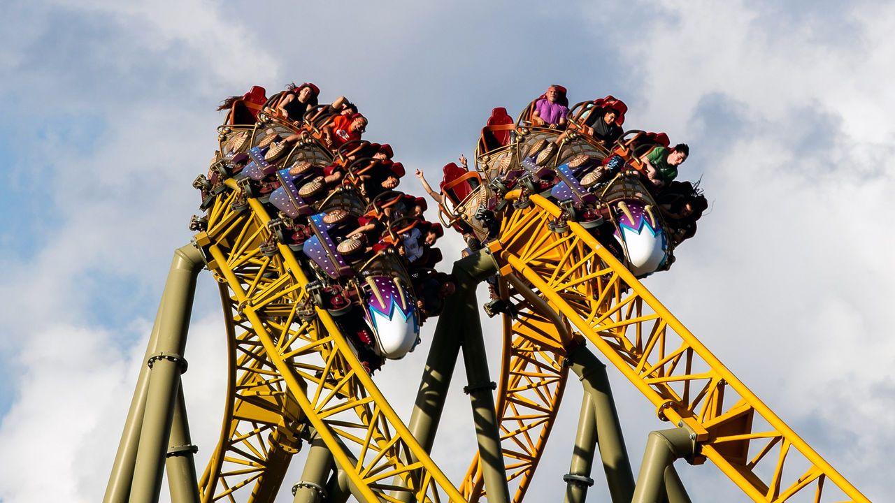 Guests ride Stardust Racers, a new dueling roller coaster ride in Celestial Park during a preview day for Universal Epic Universe.