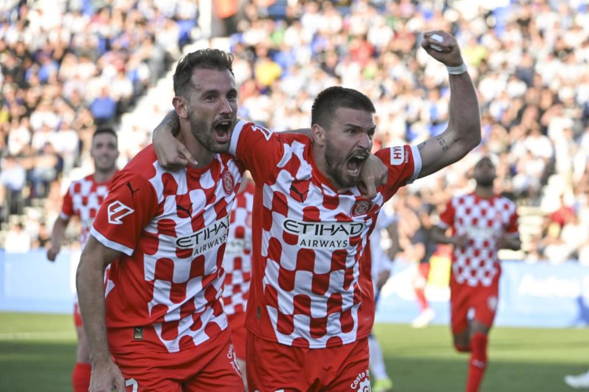 Portu e Stuani jogando na partida de Girona contra Mallorca