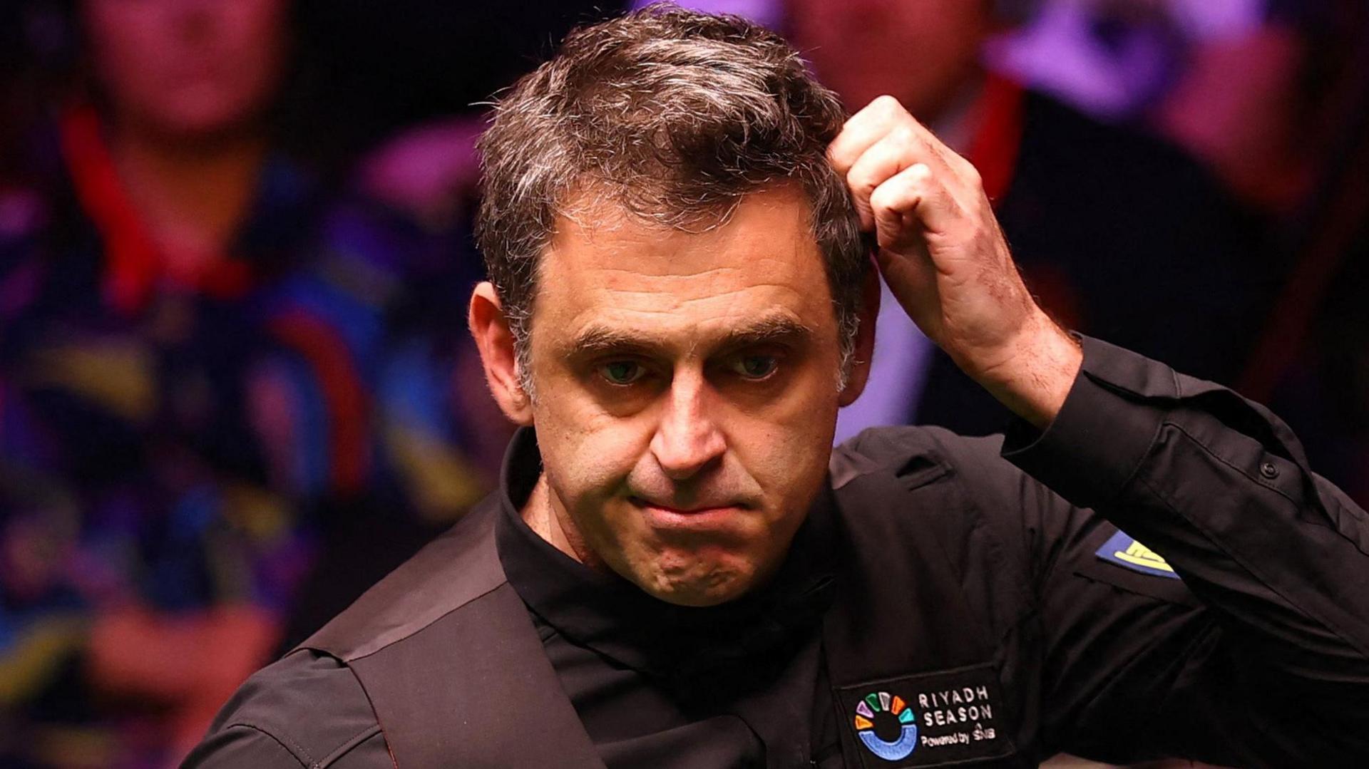 Ronnie O'Sullivan durante sua partida contra Zhao Xintong