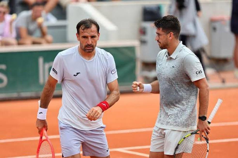 Orlando Luz e Ivan Dodig em Roland Garros