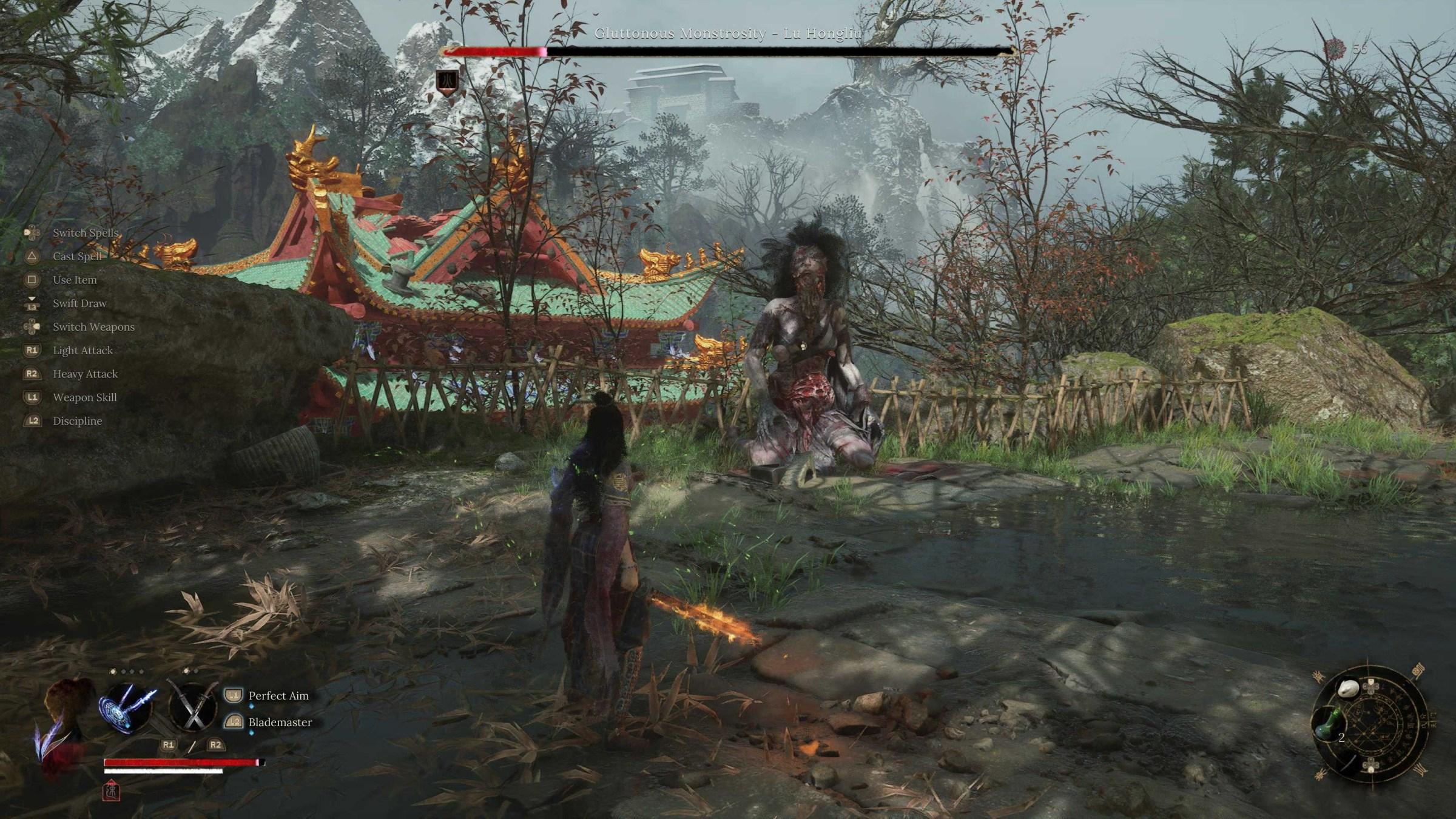 Wuchang about to finish off a boss with her flaming swords in Wuchang Fallen Feathers.