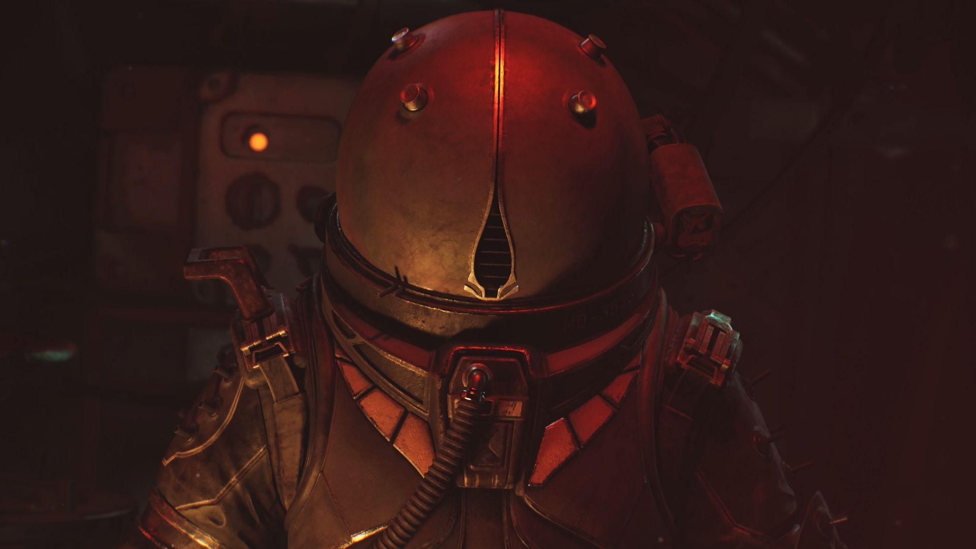 A protagonista The Traveler enfrenta a câmera, com o rosto oculto por um capacete esférico opaco.