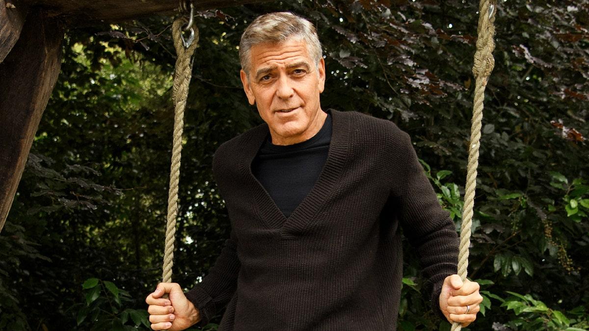 George Clooney on a swing, Esquire magazine