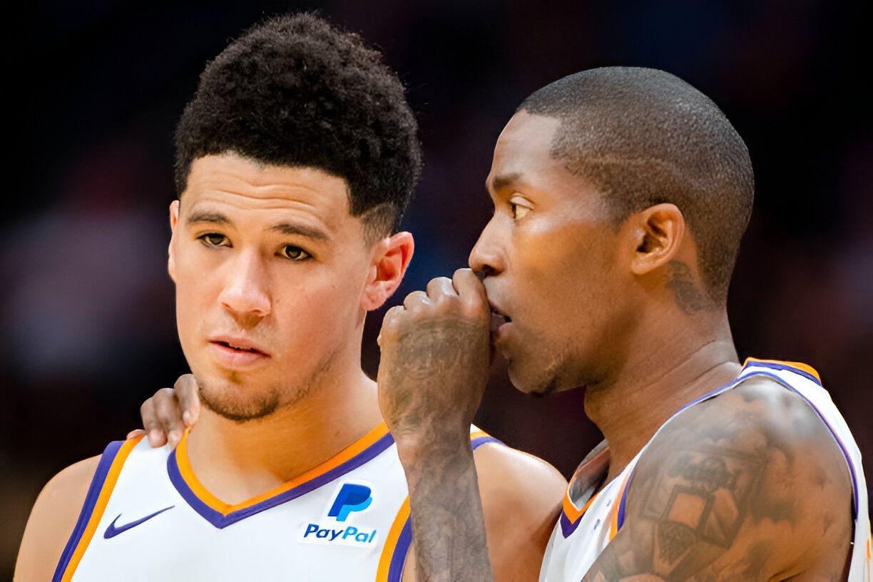 Jamal Crawford e Devin Booker durante um jogo