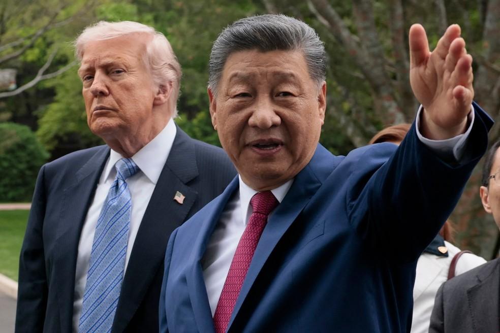 Xi Jinping e Donald Trump durante visita em Pequim em 15 de maio de 2026