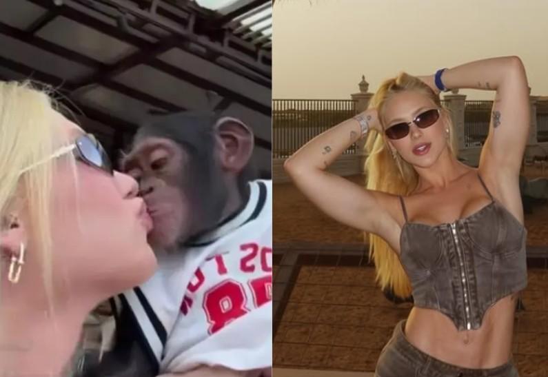 Virginia beija macaco em zoológico em Dubai