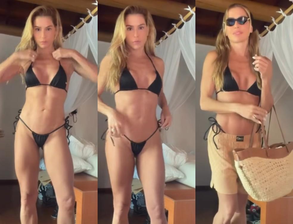 Deborah Secco exibe abdômen trincado durante as férias