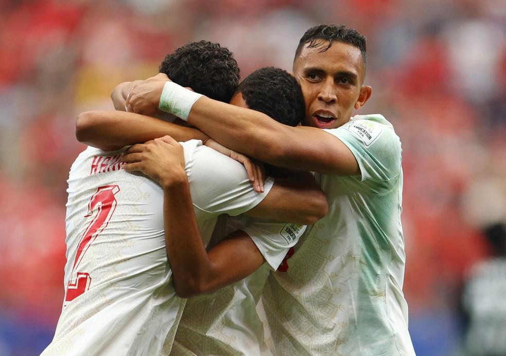Azzedine Ounahi comemora o gol com Soufiane Rahimi e Achraf Hakimi